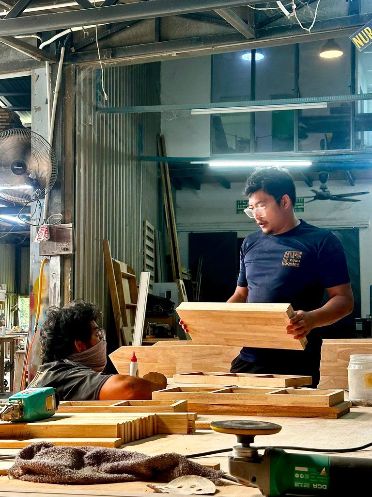 Carpenter crafting wooden furniture